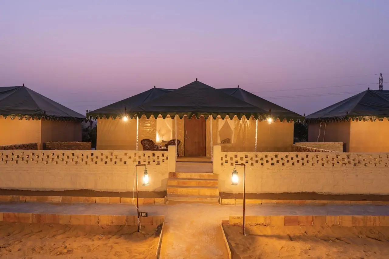 Zostel Sam Desert Camp regal cottage lit at twilight, Sam Sand Dunes Jaisalmer